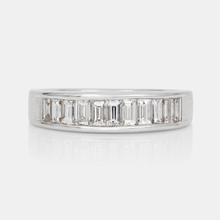 A baguette-cut diamond ring. Total diamond weight circa 0.80 ct.