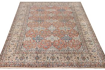 A semi-antique/old Nain carpet, part silk, c. 343 x 230 cm.