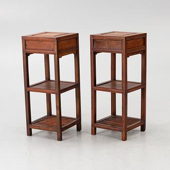 A pair of Chinese lamp tables / pedestals, hardwood, 20th century.