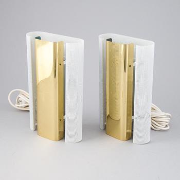 Hans-Agne Jakobsson, a pair of 'V-451/18L'/'Rasputin' brass wall lights from Markaryd.