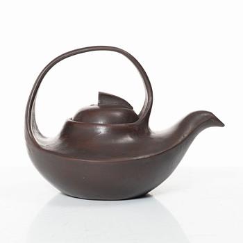 A Chinese compressed yixing teapot and cover, 20th century.