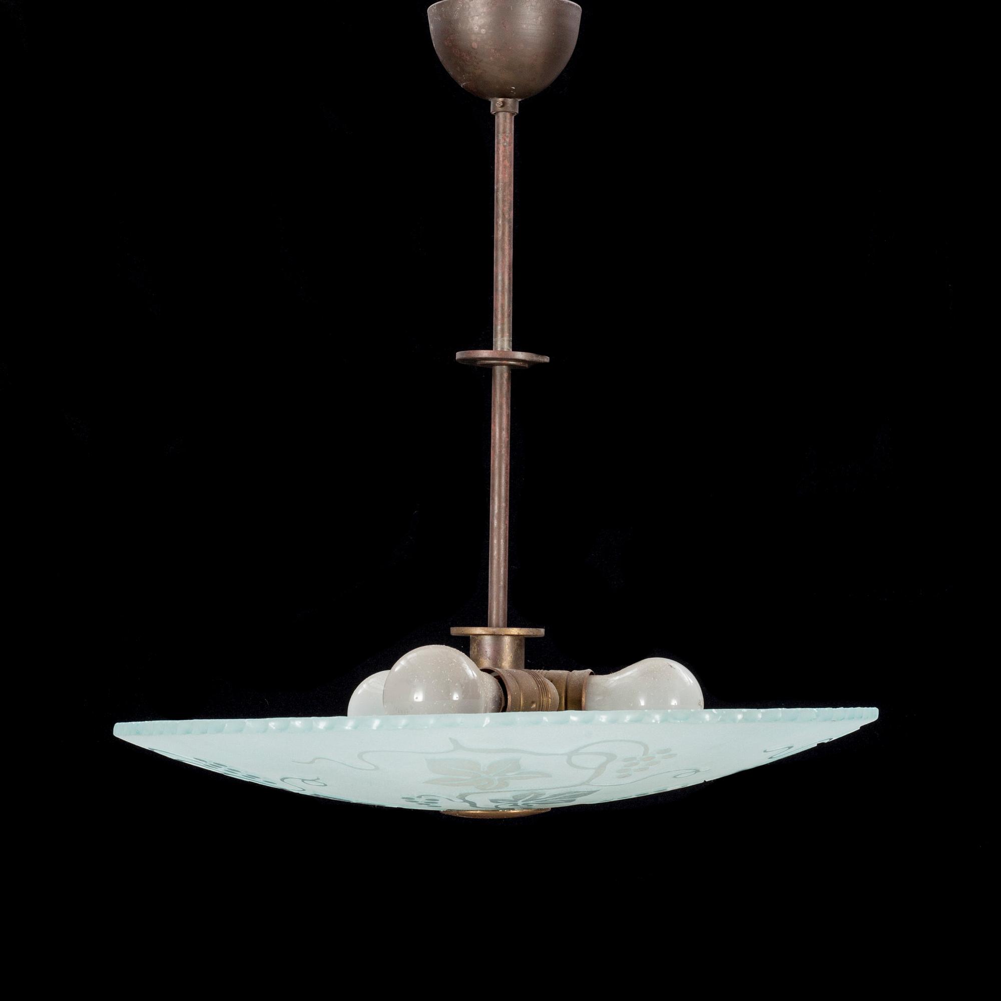 TAKLAMPA, 1900-talets första hälft.