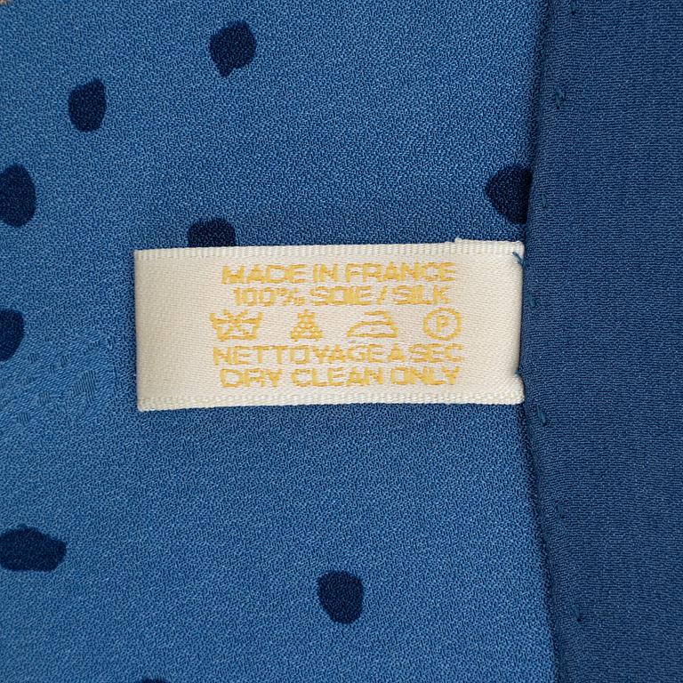 Cartier, a jaquard silk 'Poem de Marie Sebrys' scarf.