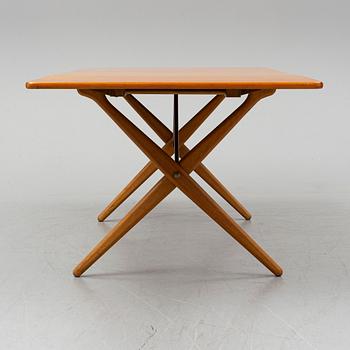 HANS J WEGNER, a teak and oak drop-leaf dining table, Andreas Tuck, Denmark 1950'-60's.