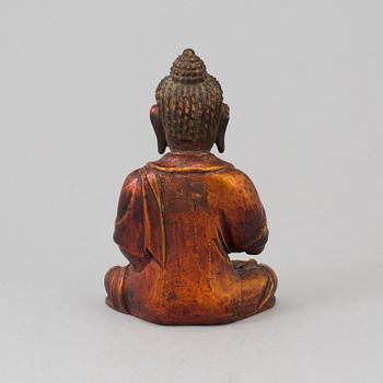 A Japanese carved wooden sculpture, late 19th century.