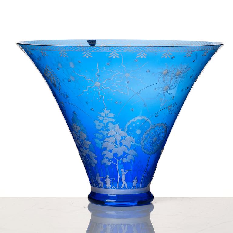 Edward Hald, an engraved blue glass "Fyrverkeriskålen" glass bowl, Orrefors 1957, engraved by Karl Rössler.