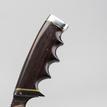 A USA Gerber hunting knife.