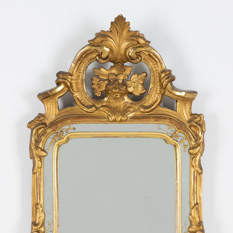 A Rococo giltwood mirror by N. Meunier (master in Stockholm 1754-97).