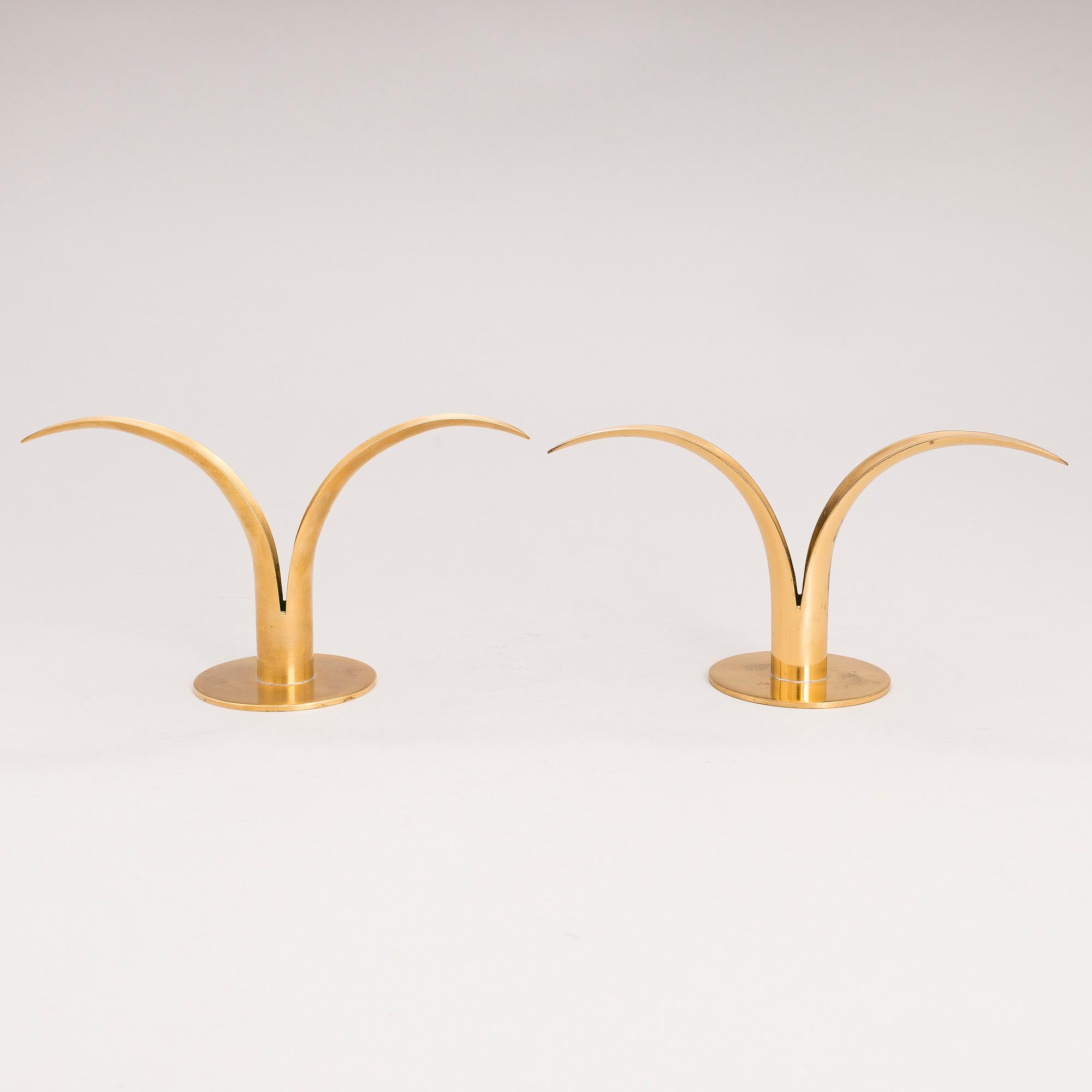 Six brass candle sticks "Liljan" by Ivar Ålenius-Björk for Ystad metall, second half of the 20th century.