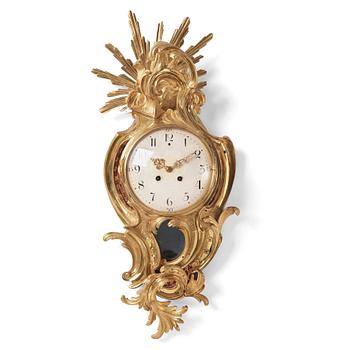 A Swedish Rococo gilt bronze wall clock, second part of the 18th century.