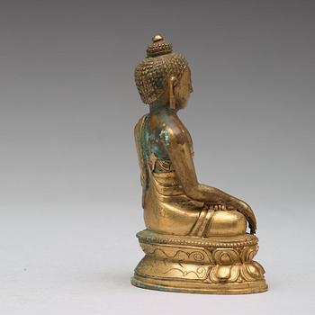 Two copper alloy figures of buddha, Sino-Tibetan, circa 1900.