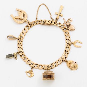 Armband 18K guld med berlocker.