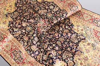 A carpet, 280 x 185 cm.