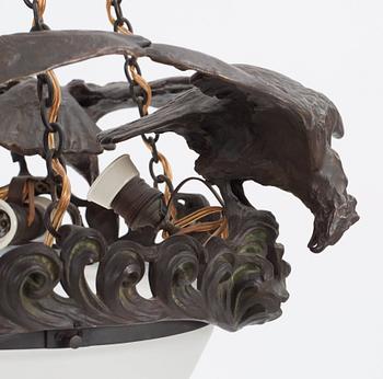 A Swedish Art Nouveau patinated bronze and patinated metal hanging lamp, reportedly designed by Ruth Milles.