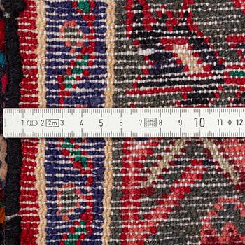 Rug, Hosseinabad, circa 310 x 112 cm.