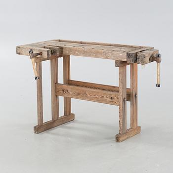 A 20th century wood working bench.