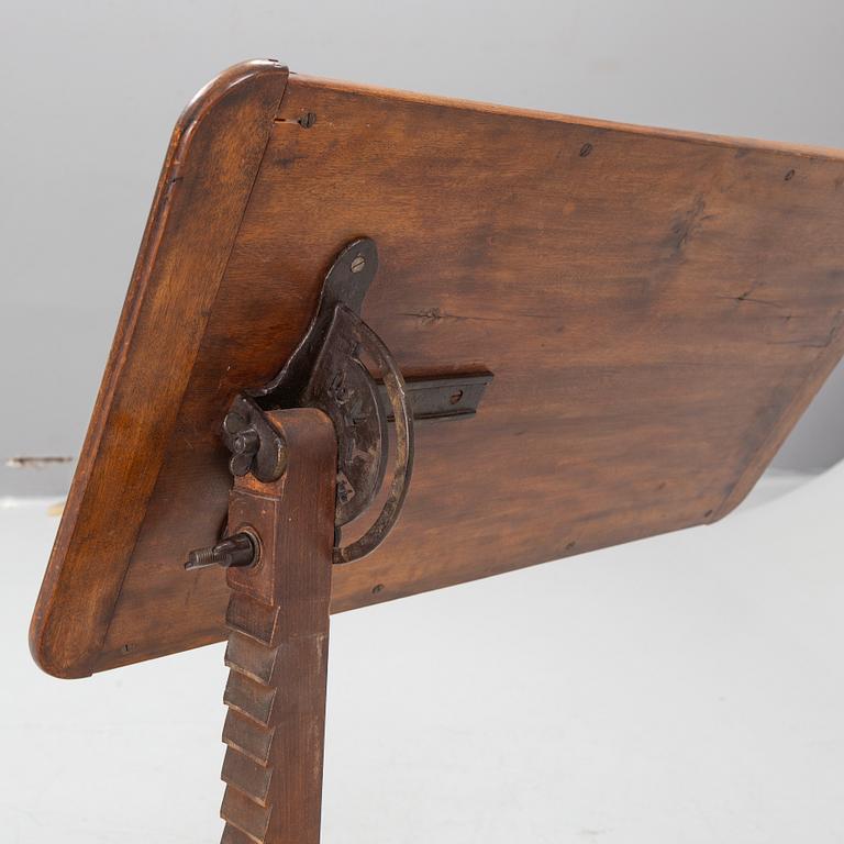 A reading table, J. Carter London, England, circa 1900.