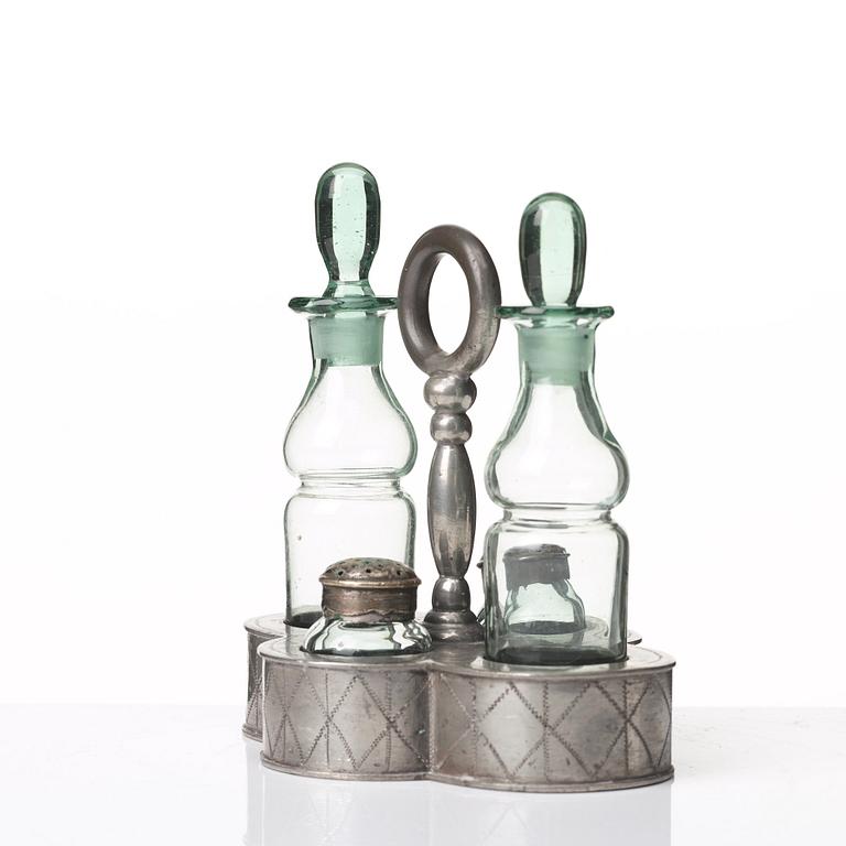 Nils Fougstedt, a pewter and glass cruet-set, Svenskt Tenn, Stockholm 1925, model 163.