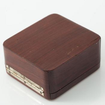 A case, marked Fabergé.
