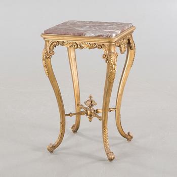 A rococo style side table, around the year 1900.