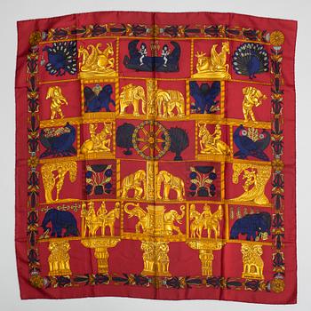 Hermès, a 'Torana' silk scarf.