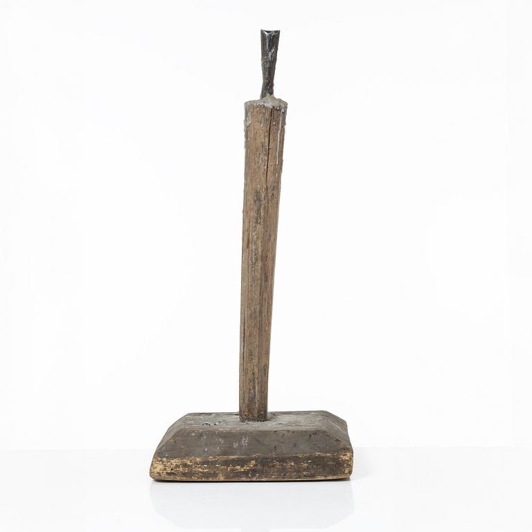 A candle stick, 19th/20th Century.