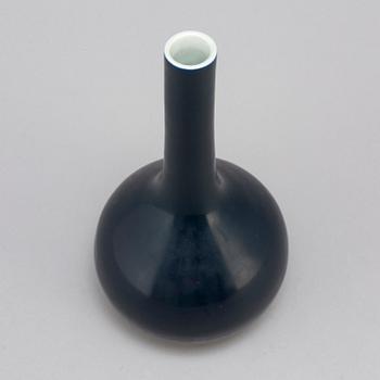 A Chinese blue glazed bottle vase, 20th century.