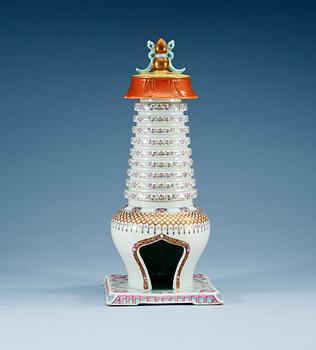 1650. A famille rose stupa, presumably early 20th Century with Qianlong's seal mark in gold.