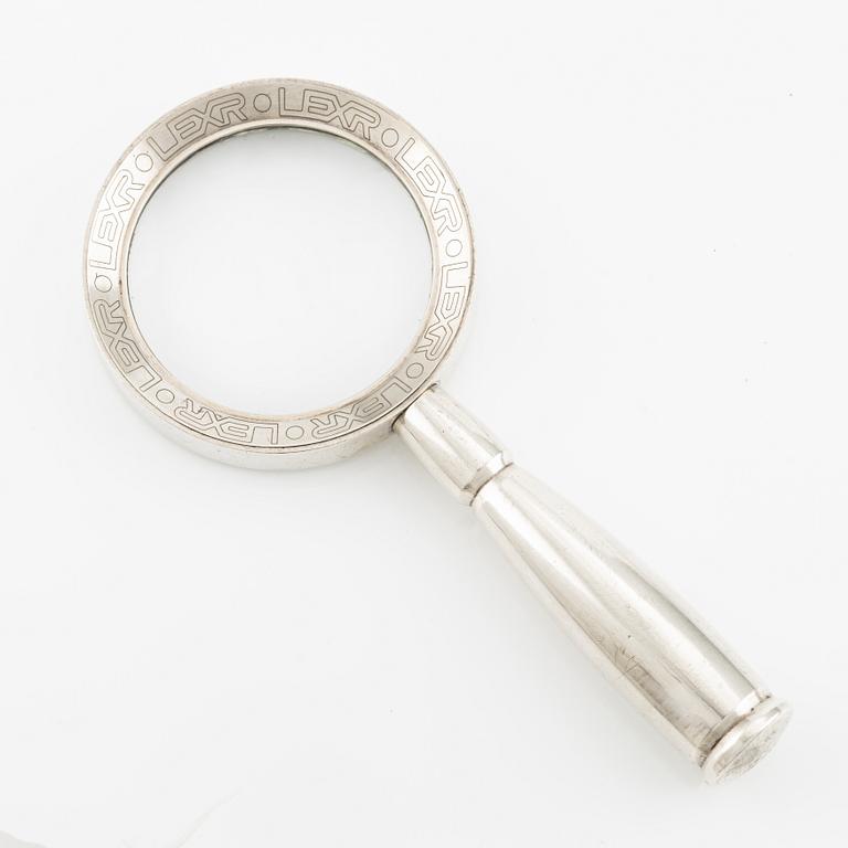 Magnifying glass, Rolex, 137 x 62 mm.