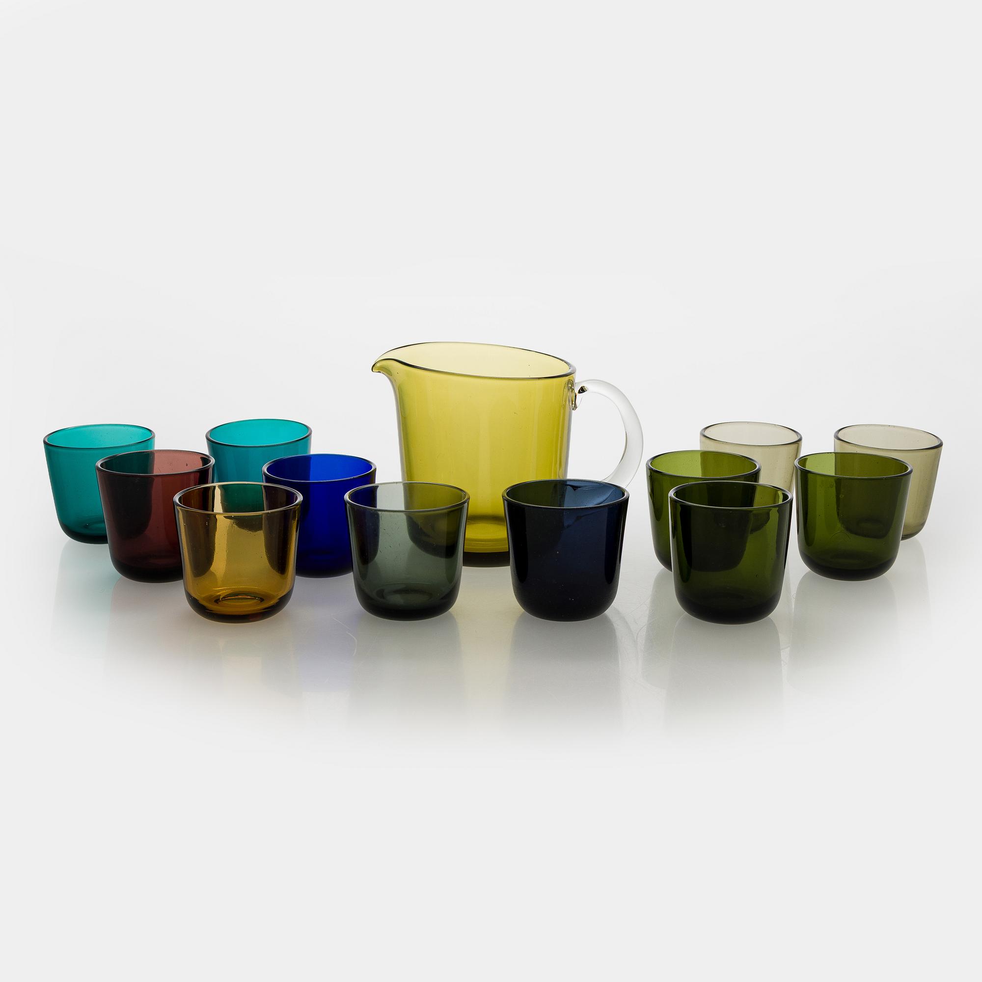 Kaj Franck, a mid-20th century "5601" glass pitcher and a twelve "5023" glasses, Nuutajärvi, Finland.