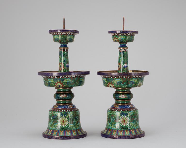 A pair of cloisonné candle sticks, 20th century.