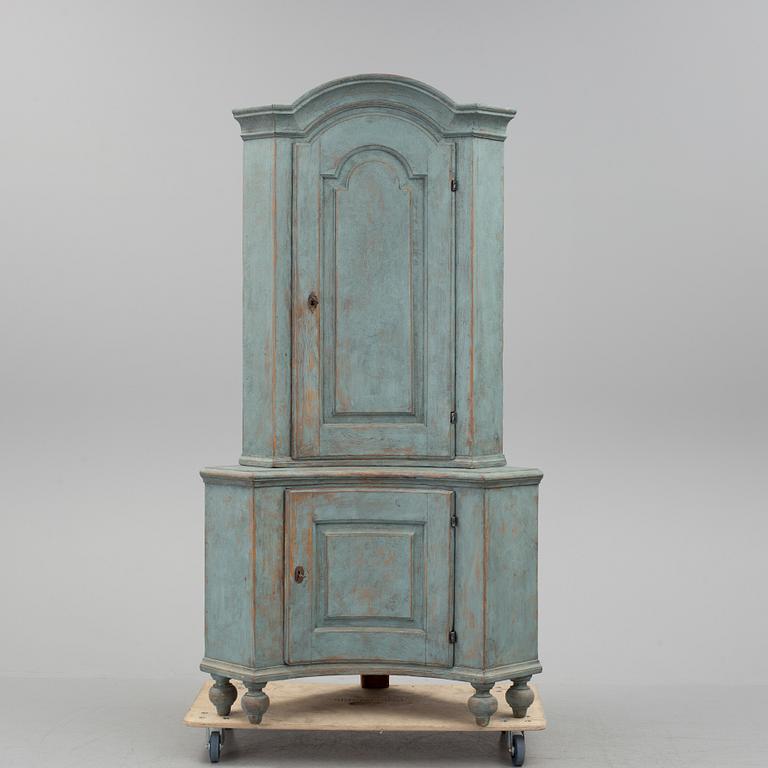 A 18th century corner cabinet.