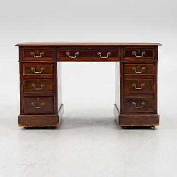 An English style desk, circa 1900.