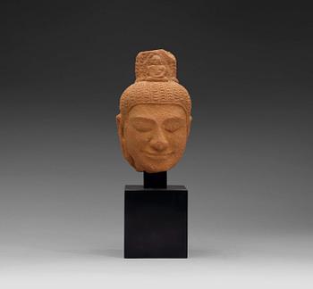 A sand stone figure of a Buddhas head, Thailand presumably 12th century.