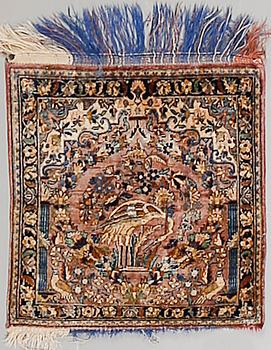 A Keshan silk rug, semiantique, ca 51 x 49 cm.