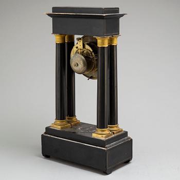 A mid 19th century mantel clock, probably France.