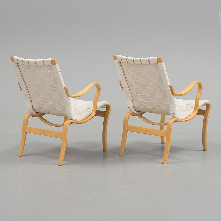 a pair of "Mina" armchairs by Bruno Matsson.