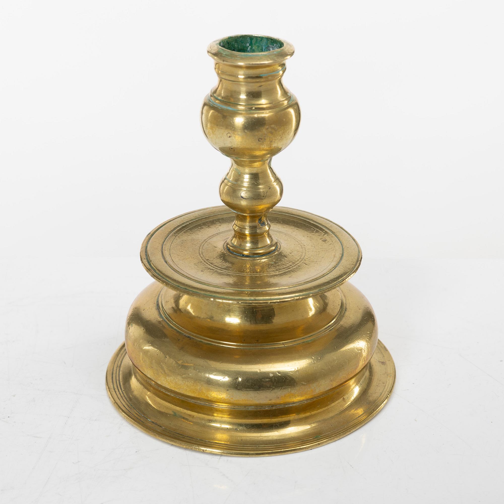 A Northern European baroque brass candlestick, late 17th century.