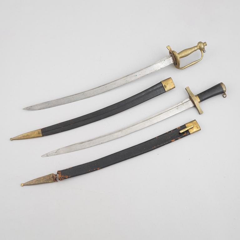 Two cutlasses, Swedish, m/1856 and m/1748-1856, with sheath.