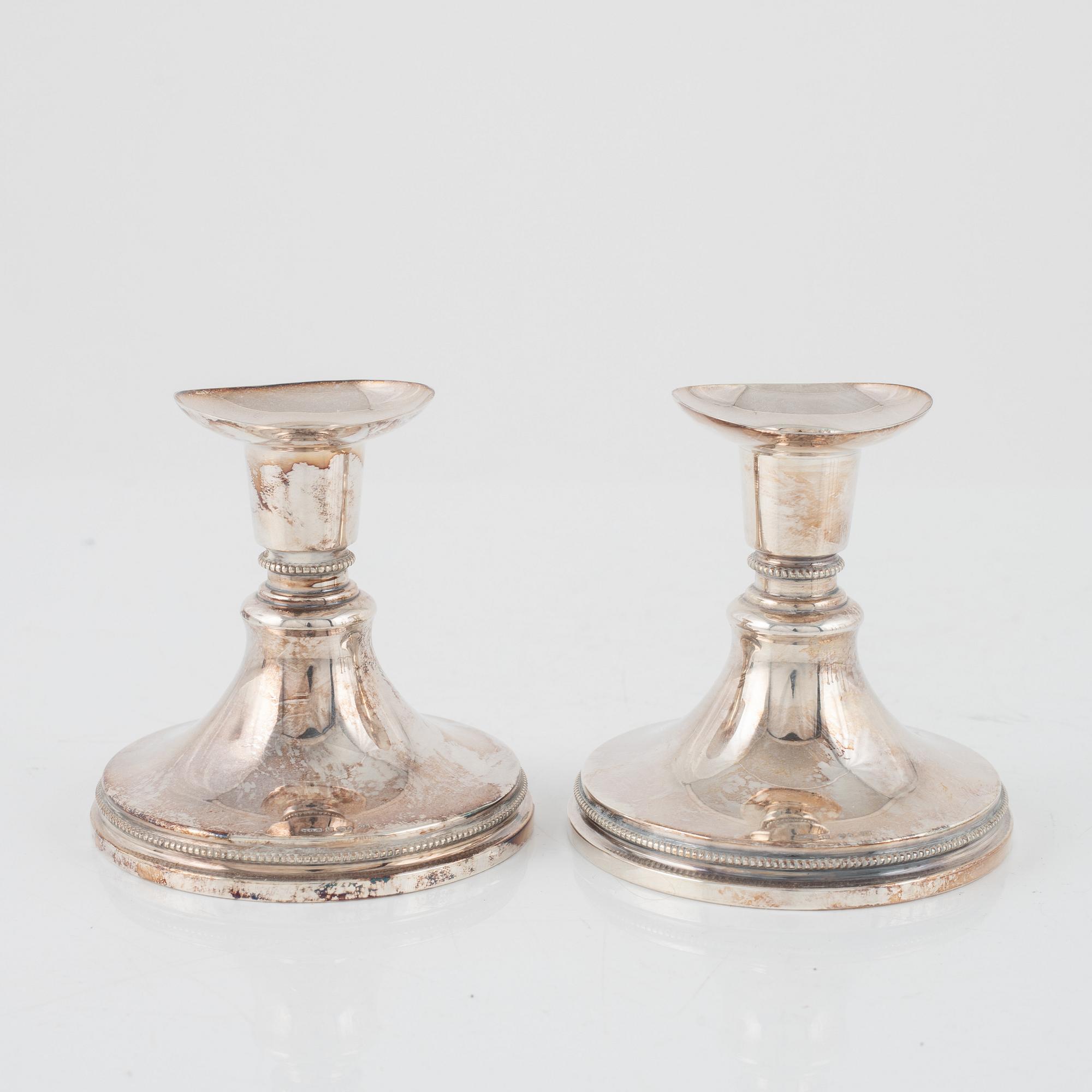 Candlesticks, silver, two pairs and two odd ones, MGAB, GAB, and Ceson Guldvaru Ab, Sweden, 1957-1981.