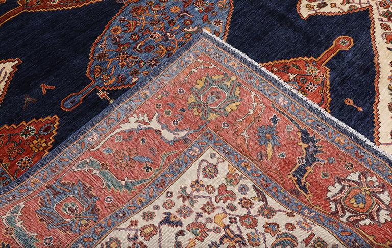 A Zigler, Heris Design carpet, 298 x 247 cm.