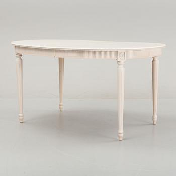 A dining table with eight chairs and a stool, Gustavian style, second half of the 20th Century.
