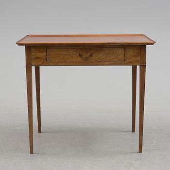 A 19th century mahogany table with drawer.