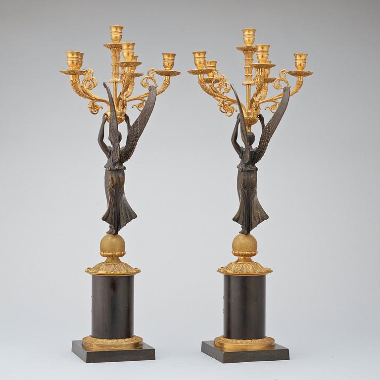 A pair of Empire-style late 19th century six-light candelabra.