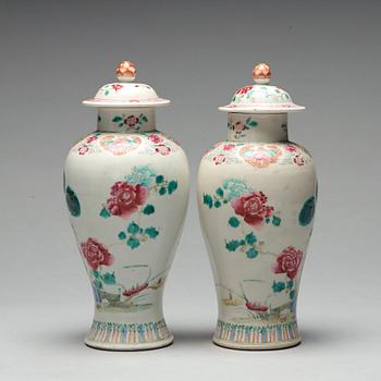 A pair of famille rose vases with covers, Qing dynasty, Qianlong (1736-95).