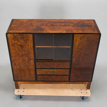 A 1930s functionalist style cabinet.