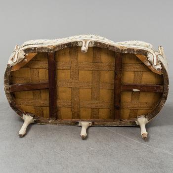 A Louis XV sofa.