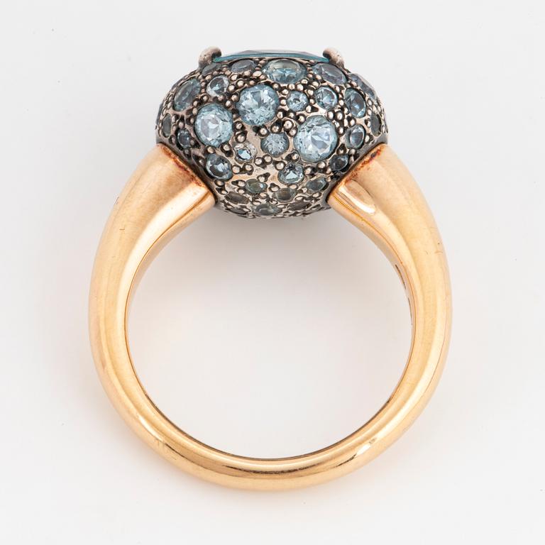 Pomellato ' Tabou' ring, 18K gold and silver with blue topazes.