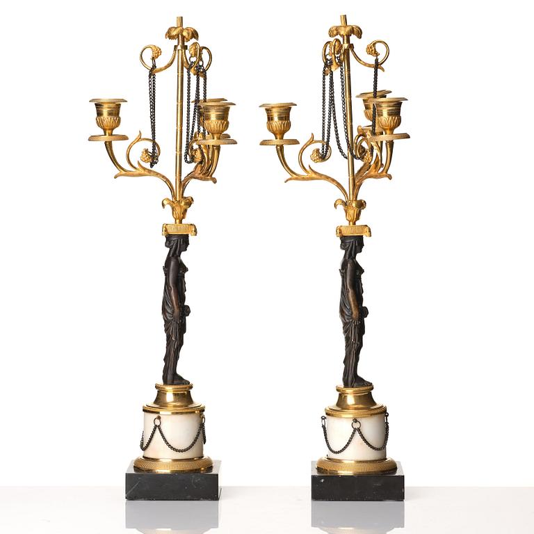 A pair of late Gustavian circa 1800 three-light candelabra, attributed to F L Rung.