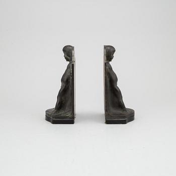 Azel Gute, a pair of bronze bookends, signed and dated 1920.